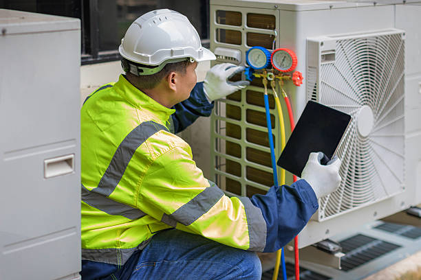 Professional Emergency Ac Repair technician working in Dunlap, IL